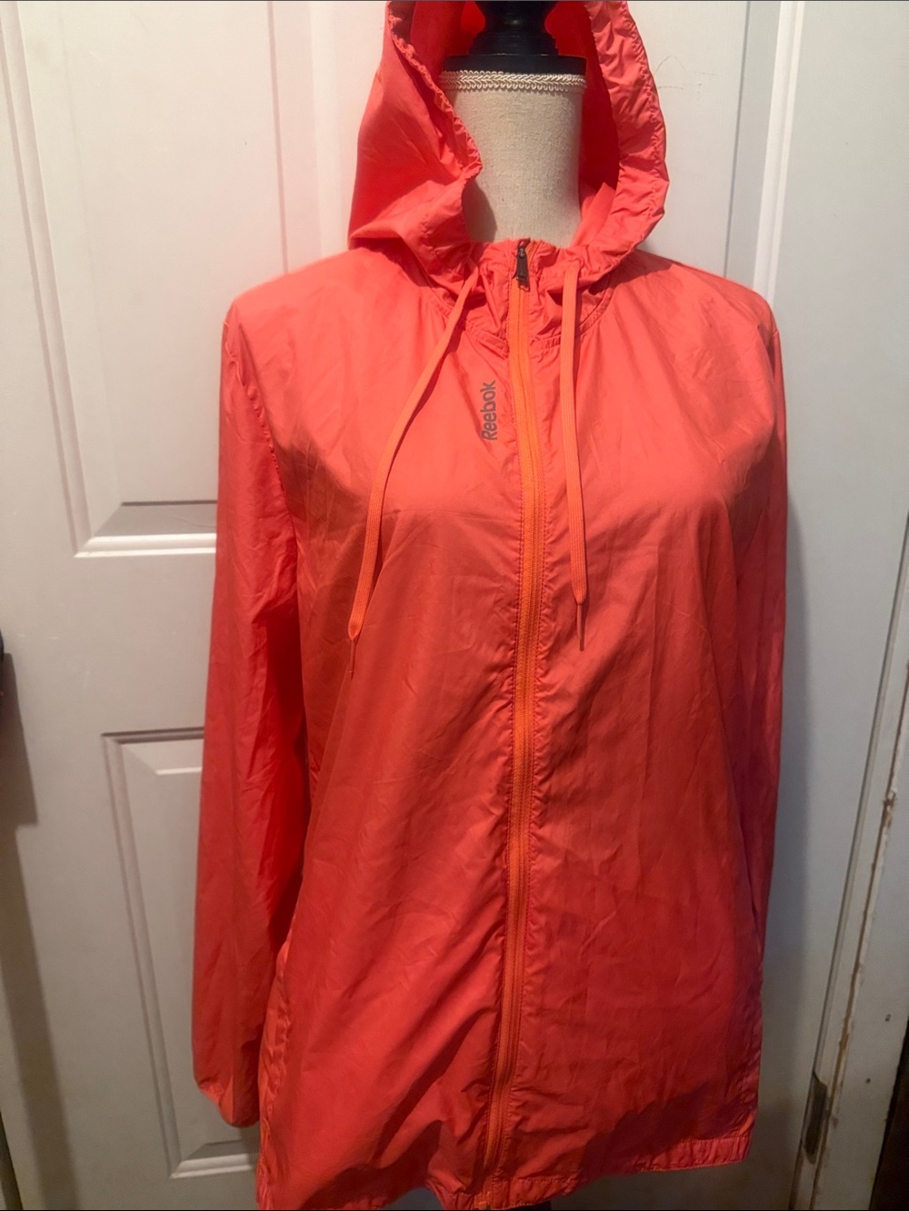 Reebok Coral-Orange Lightweight Hooded Windbreaker Jacket